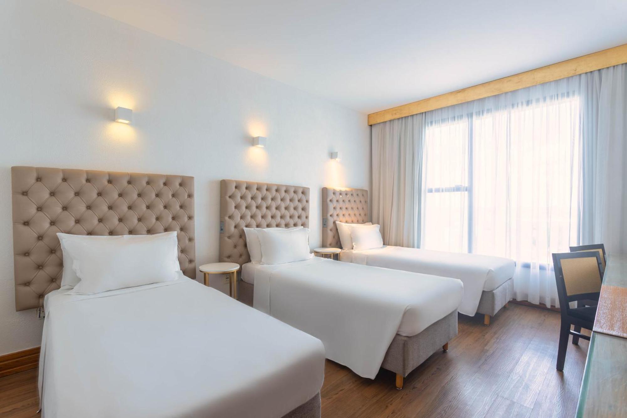 Ouro Minas Hotel Belo Horizonte, Dolce By Wyndham Экстерьер фото A room at the hotel