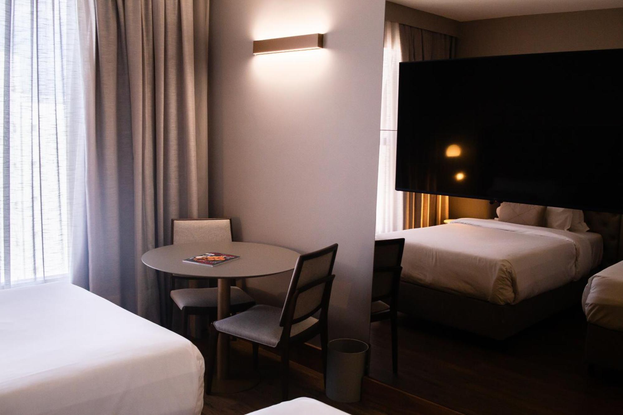 Ouro Minas Hotel Belo Horizonte, Dolce By Wyndham Экстерьер фото A room at the hotel