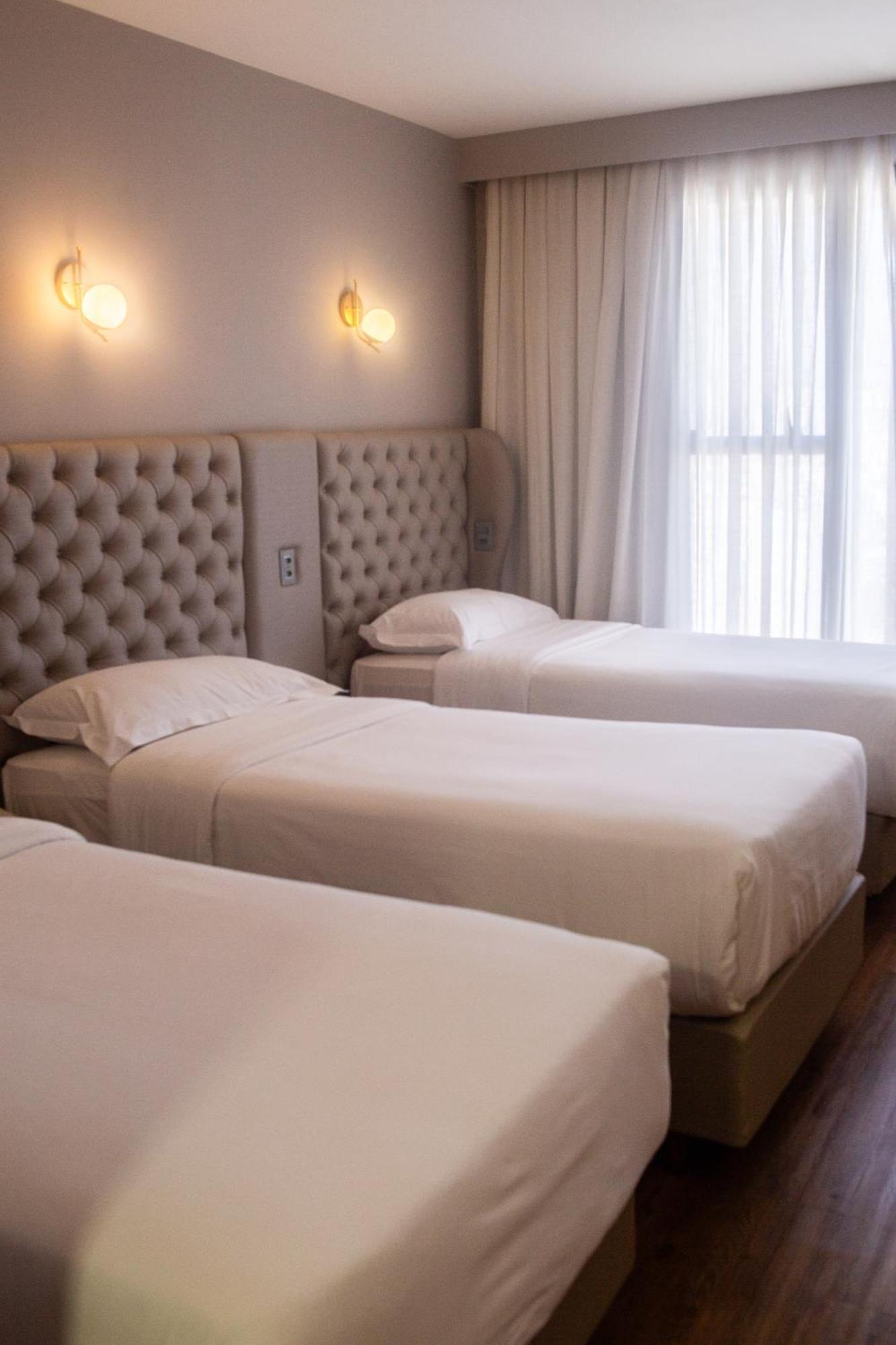 Ouro Minas Hotel Belo Horizonte, Dolce By Wyndham Экстерьер фото A room at the hotel